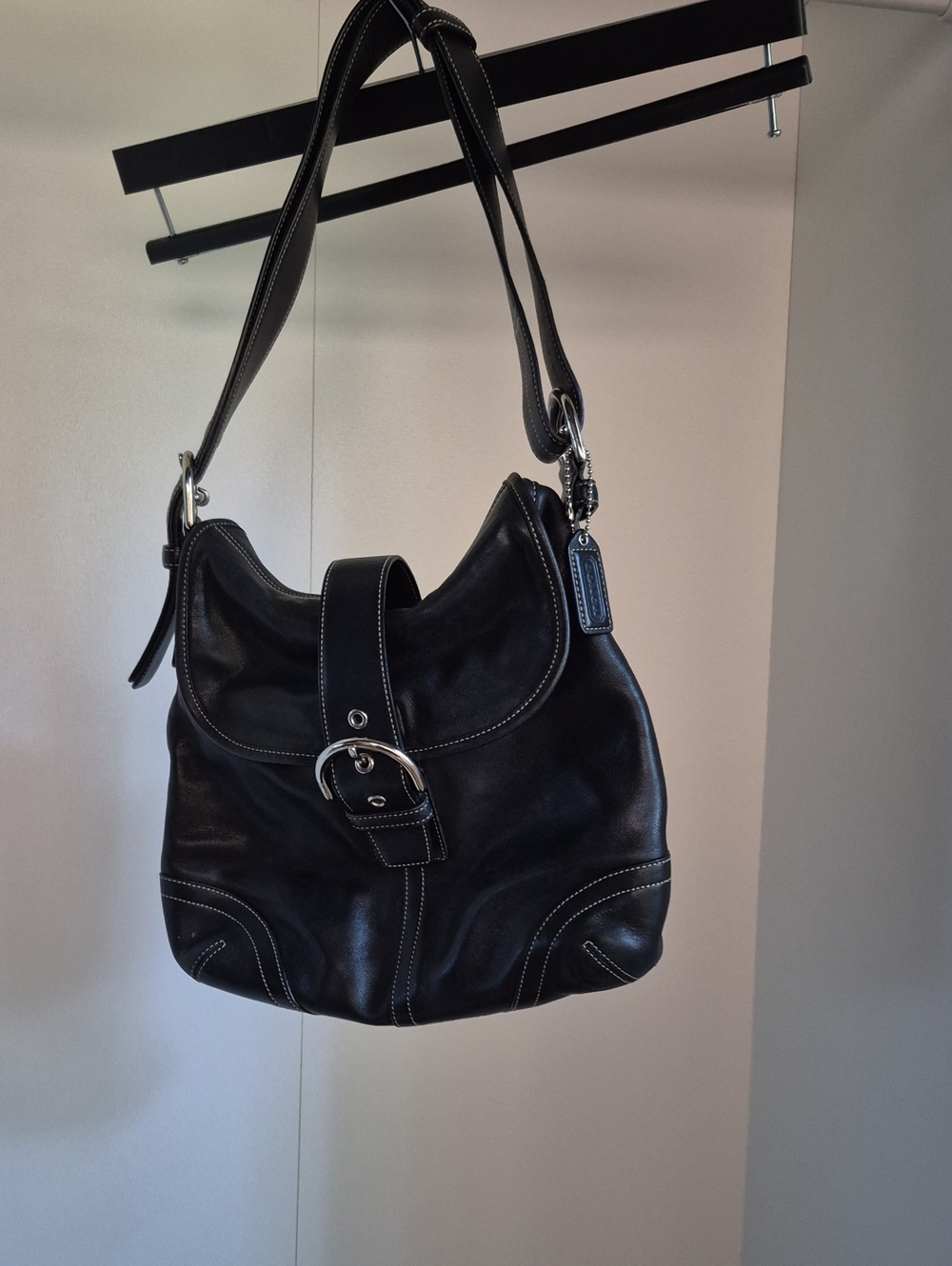 Coach Black Leather Shoulder Bag with Buckle Strap and Silver Hardware